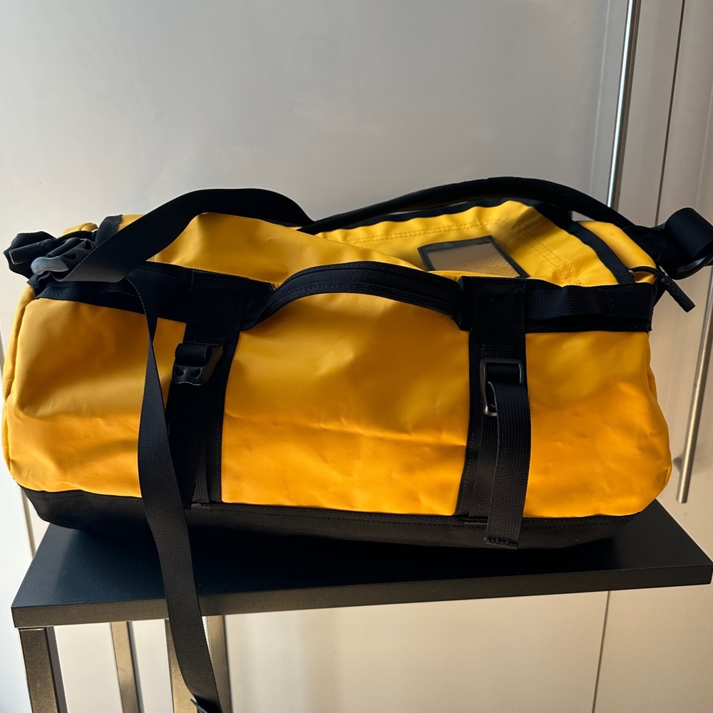 The North Face yellow XS base camp duffel
